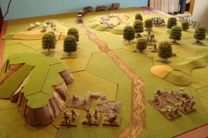 Convoy Approaches. Germans in foreground, Partisans in woods, and cavalry behind ridge.