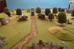 Lead Vehicles blasted off road by German machine guns.