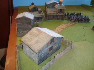 Close up of The Village.  A mix of purchased and scratch built buildings.
